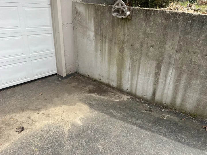 The same Nashua, NH garage floor clear and clean after Rocky's Junk Removal removed the debris